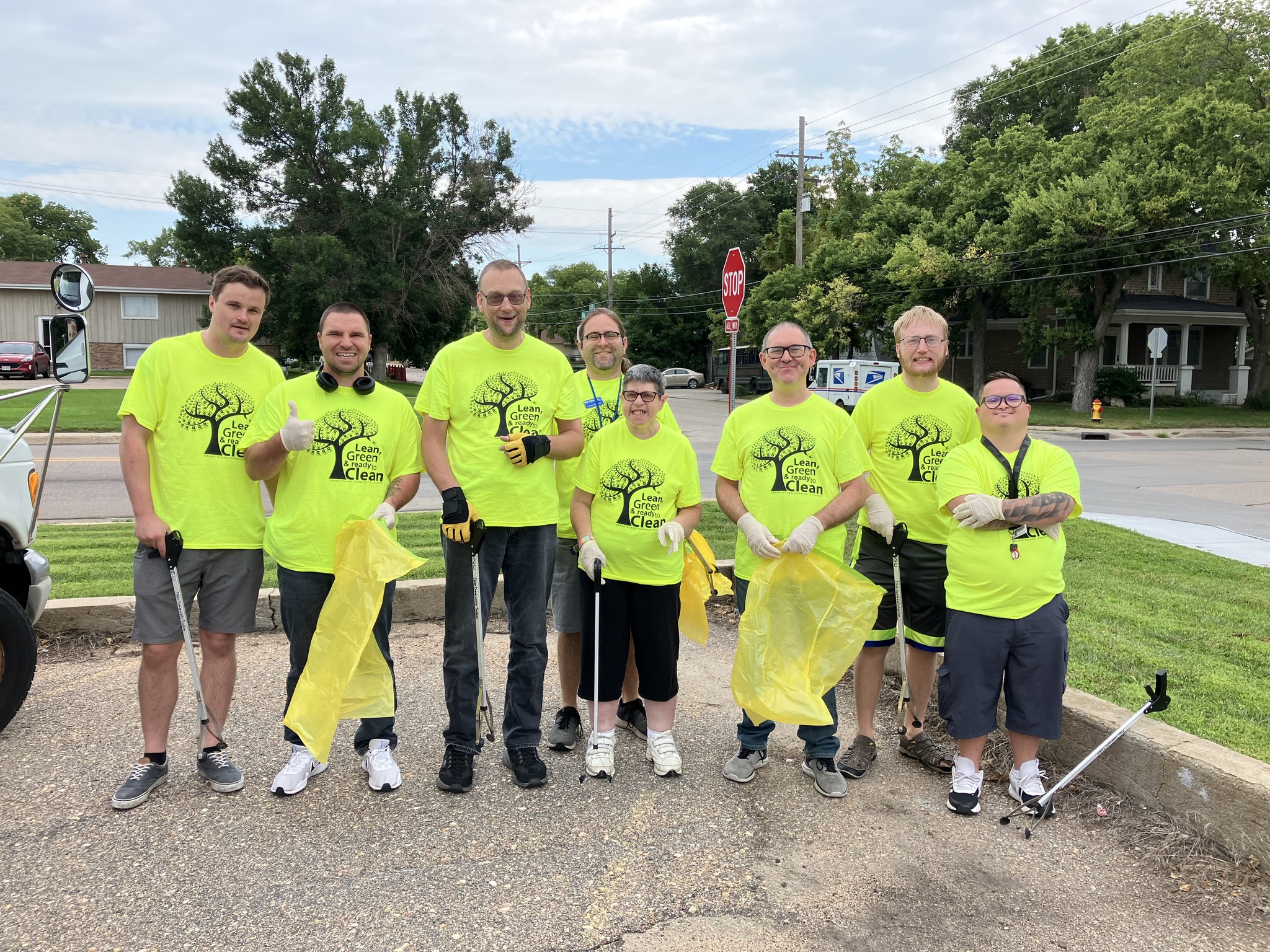 Goodwill Participants and Staff volunteer for Gi Clean Community Systems Fair Clean up Day